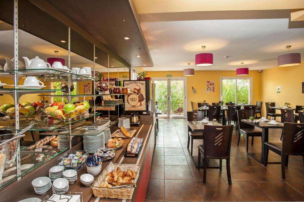 Brit Hotel Confort Villeneuve Sur Lot Bias  Ресторан фото
